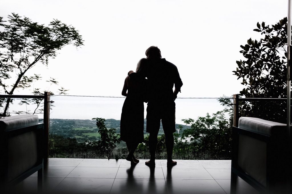 Costa Rica Featuring Kura Villas luxury modern boutique hotel infinity pool terrace H&M uvita quepos travel Charleston Fashion Blogger Dannon K. Collard Almost Happening silhouette couple picture