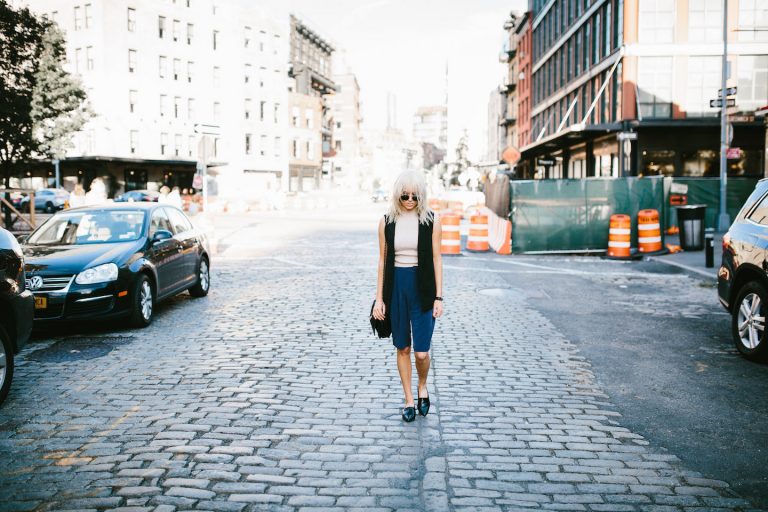 Boyish NYFW Street Style New York Fashion Week 2016 SS17 Street Style Fashion Trends Runway shaggy 70’s hair bangs women ribbed mock neck tank Abercrombie & Fitch Long satin bermuda shorts H&M Longline Black Vest Loafers Forever 21 // Charleston Fashion Blogger Dannon Almost Happening