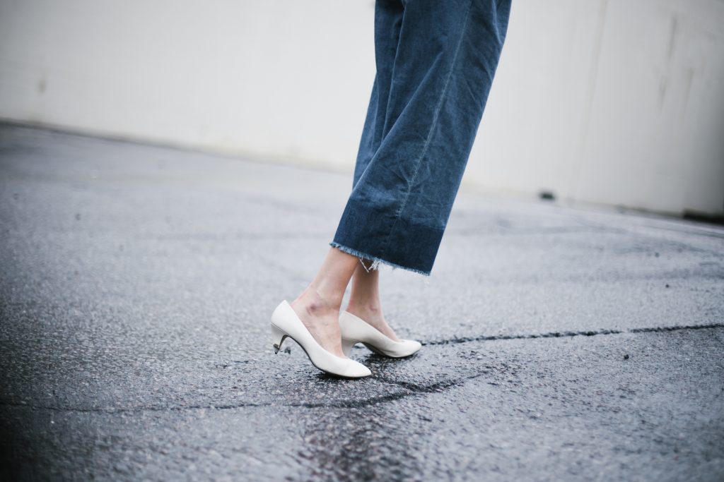 denim jumpsuit frayed wide leg culottes black biker leather jacket white kitten heels block blogger street style fall autumn 2016 // Charleston Fashion Blogger Dannon Almost Happening