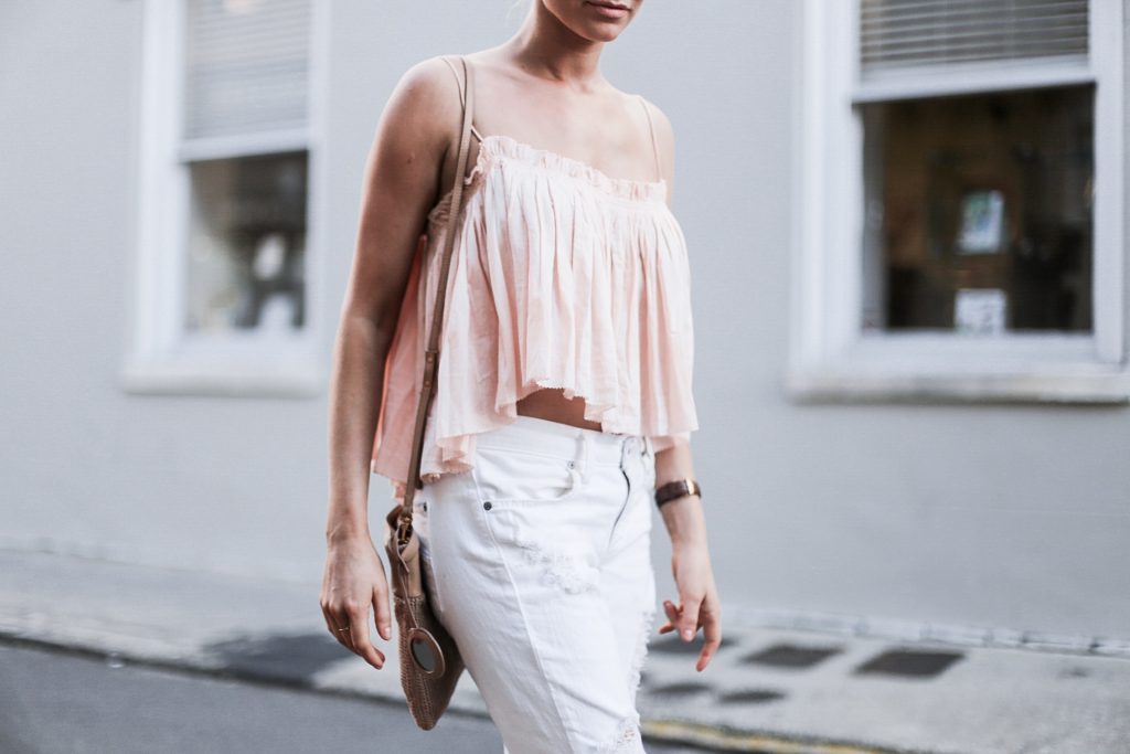 Beachy Apiece Apart Sanna Cropped Cami in Pink Quartz white distressed boyfriend jeans jbrand the sak tomboy crochet cross body satchel platinum blonde hair spring southern street style downtown // Charleston Fashion Blogger Dannon Almost Happening 