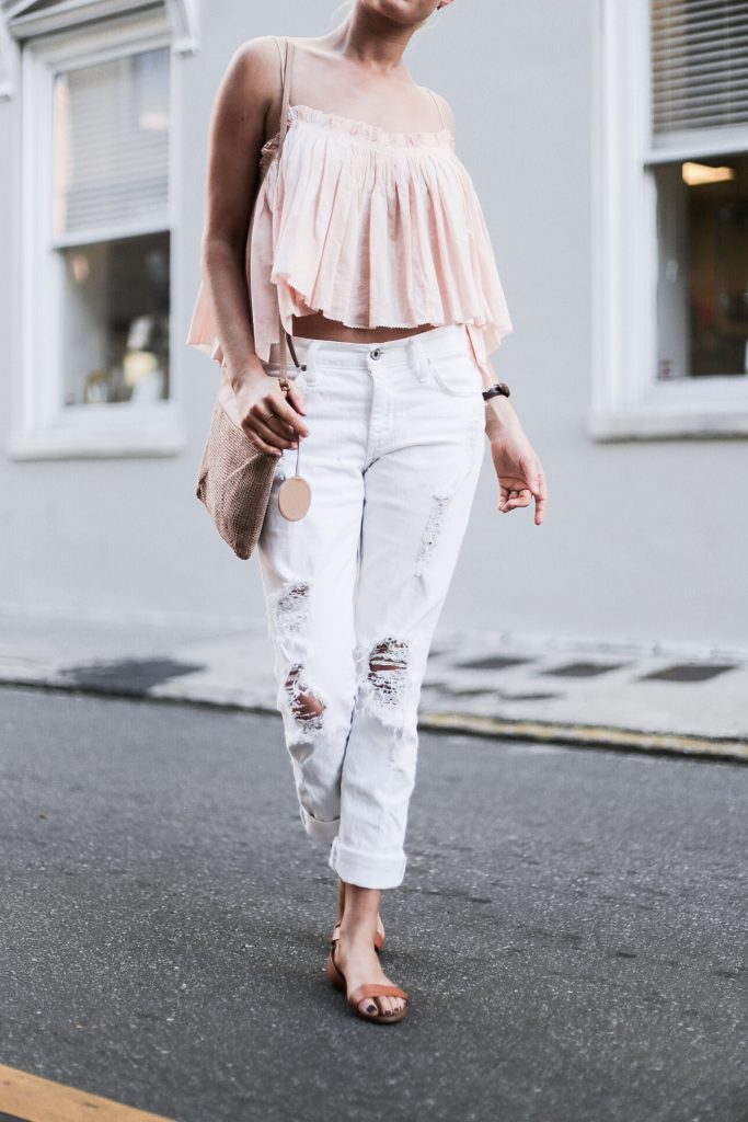 Beachy Apiece Apart Sanna Cropped Cami in Pink Quartz white distressed boyfriend jeans jbrand the sak tomboy crochet cross body satchel platinum blonde hair spring southern street style downtown // Charleston Fashion Blogger Dannon Almost Happening 