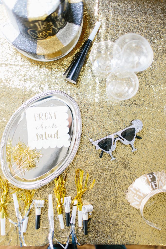 1920's New Years Party Charleston roaring twenties champagne tower great gatsby decor black white gold blush tablescape display black tie Charleston Fashion Blogger Dannon Almost Happening