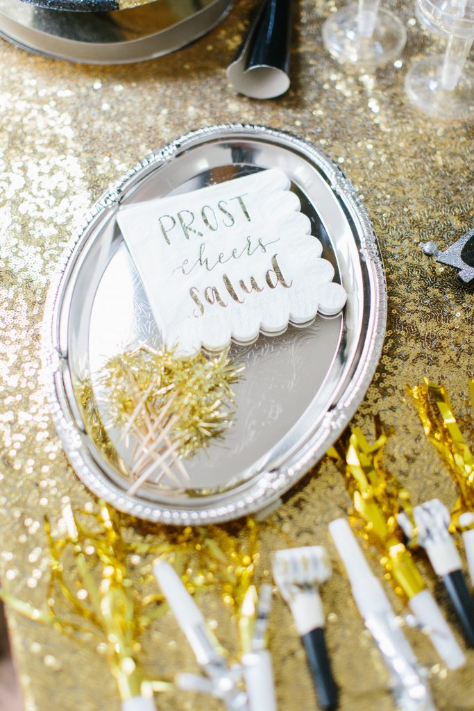 1920's New Years Party Charleston roaring twenties champagne tower great gatsby decor black white gold blush tablescape display black tie Charleston Fashion Blogger Dannon Almost Happening