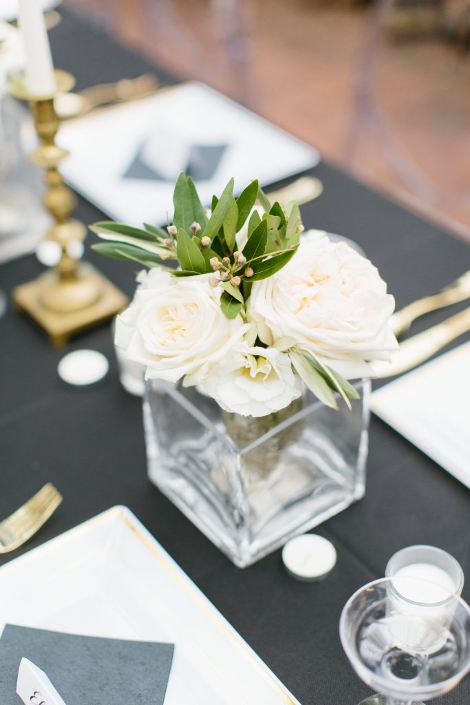 1920's New Years Party Charleston roaring twenties champagne tower great gatsby decor black white gold blush tablescape display black tie Charleston Fashion Blogger Dannon Almost Happening