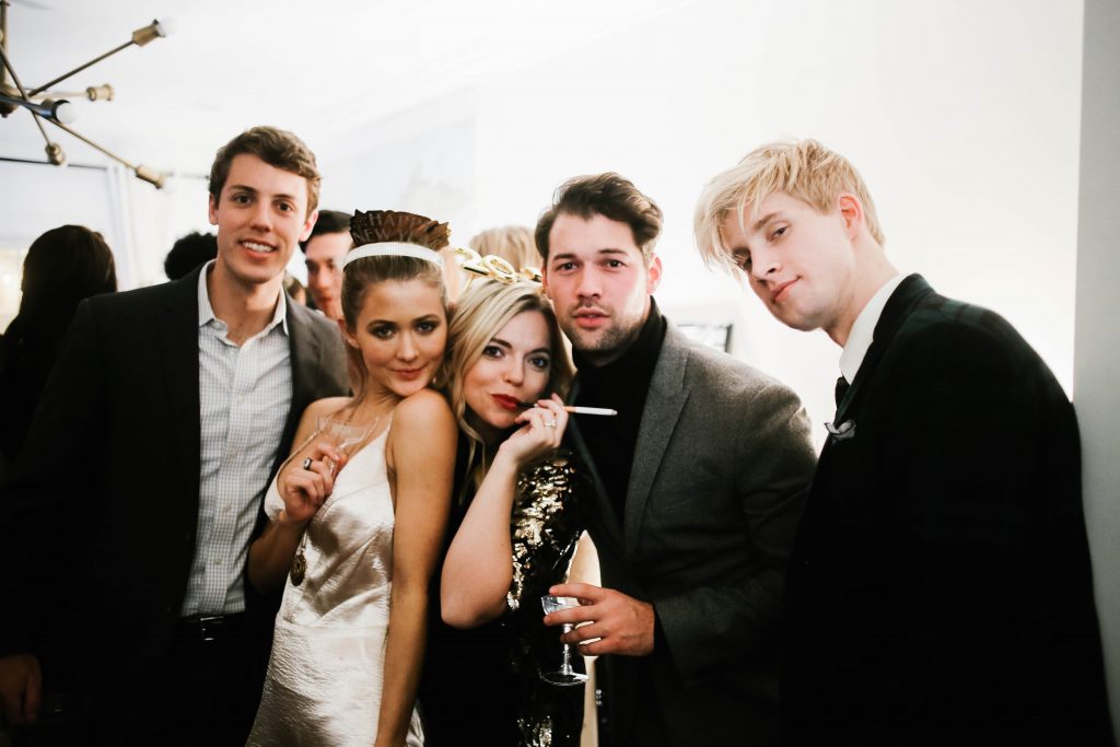 1920's New Years Party Charleston roaring twenties champagne tower great gatsby decor black white gold blush tablescape display black tie Charleston Fashion Blogger Dannon Almost Happening