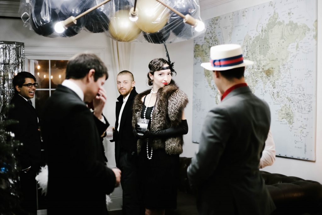 1920's New Years Party Charleston roaring twenties champagne tower great gatsby decor black white gold blush tablescape display black tie Charleston Fashion Blogger Dannon Almost Happening