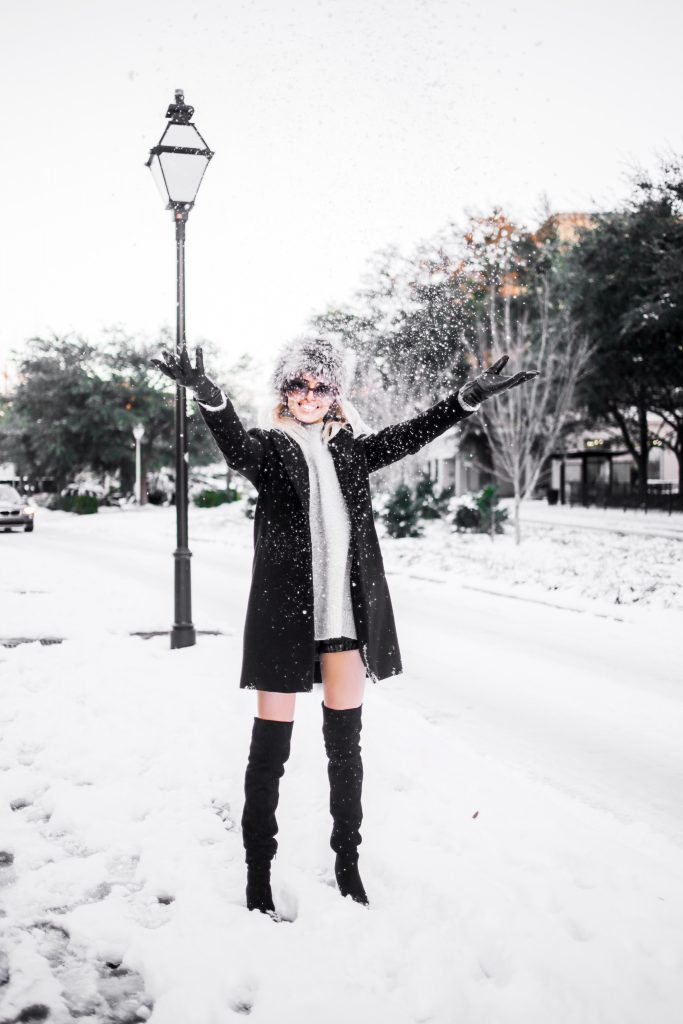 Snow Bunny in Charleston SC king street January 4th 2018 faux fur hat oversized sunglasses thigh high boots H&M forever 21 black coat high neck sweater Charleston Fashion Blogger Dannon Almost Happening