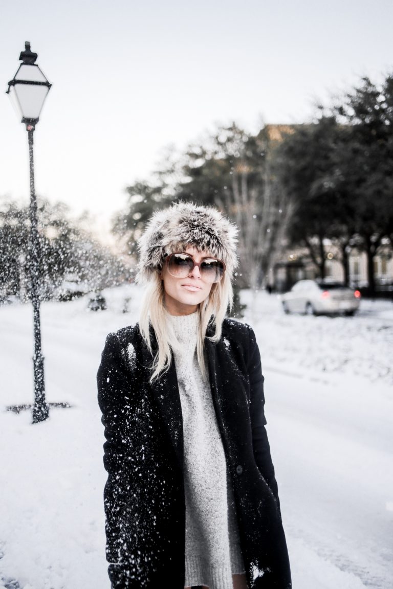 Snow Bunny in Charleston SC king street January 4th 2018 faux fur hat oversized sunglasses thigh high boots H&M forever 21 black coat high neck sweater Charleston Fashion Blogger Dannon Almost Happening