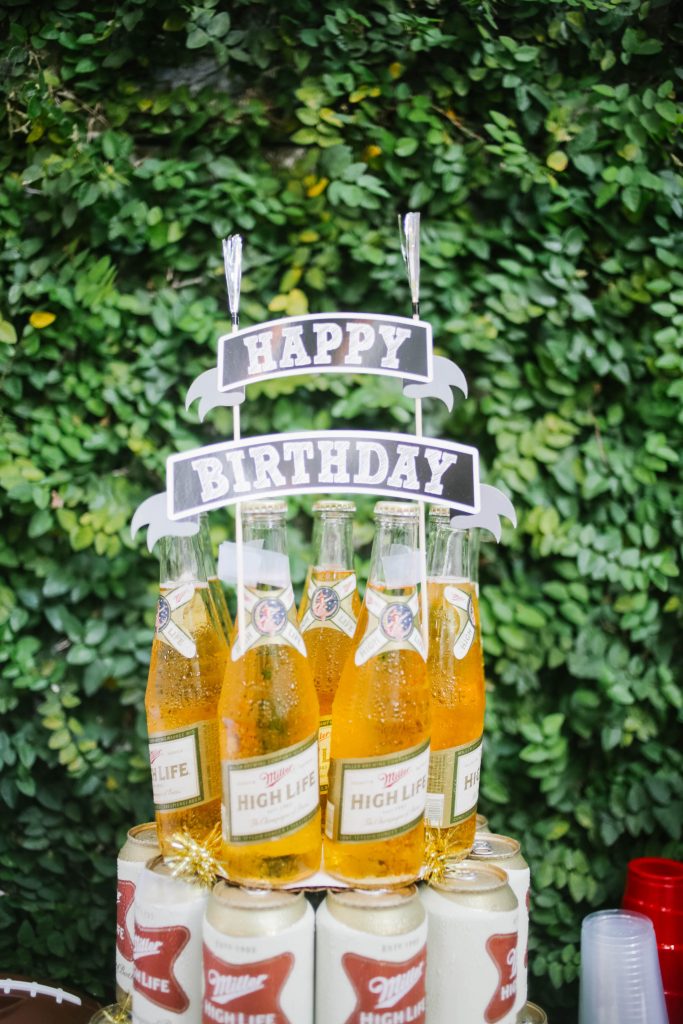carolina gamecocks tailgate themed party // charleston fashion lifestyle blogger dannon k collard hammy catering beer tower high life miller birthday cake